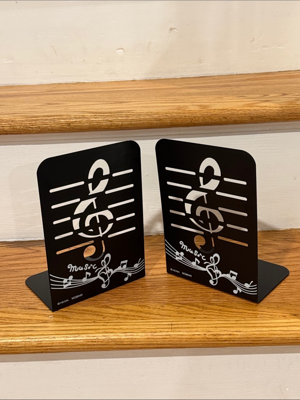 Unique black metal book stands/bookends for children's room, music room, office